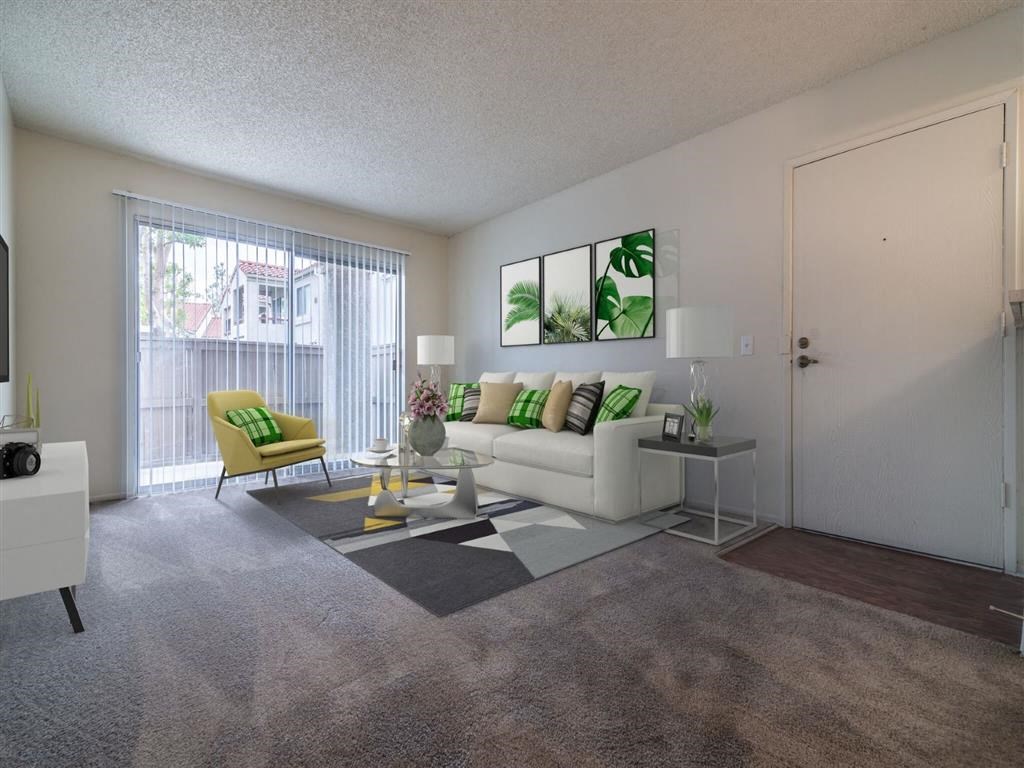 a living room with a couch and a table