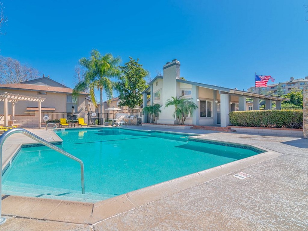 a swimming pool with a building