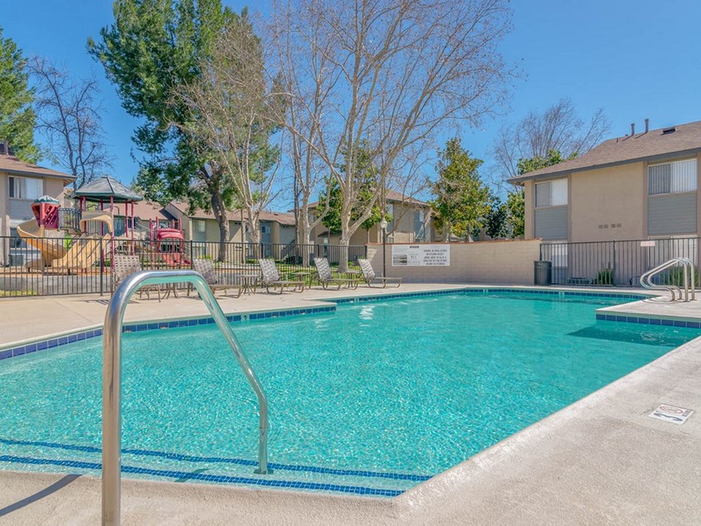our apartments have a swimming pool with a fence around it