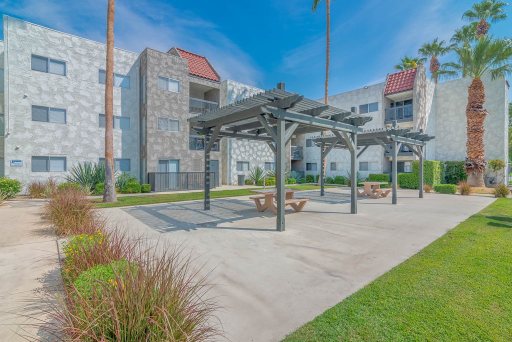 our apartments have a picnic area with benches and awning