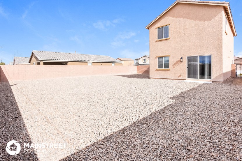 a large driveway in front of a house