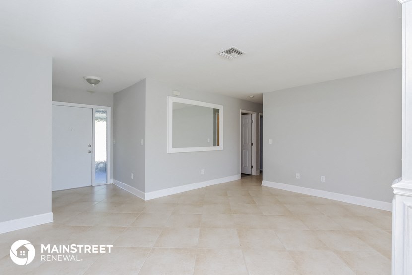 the living room is clean and ready for us to move in