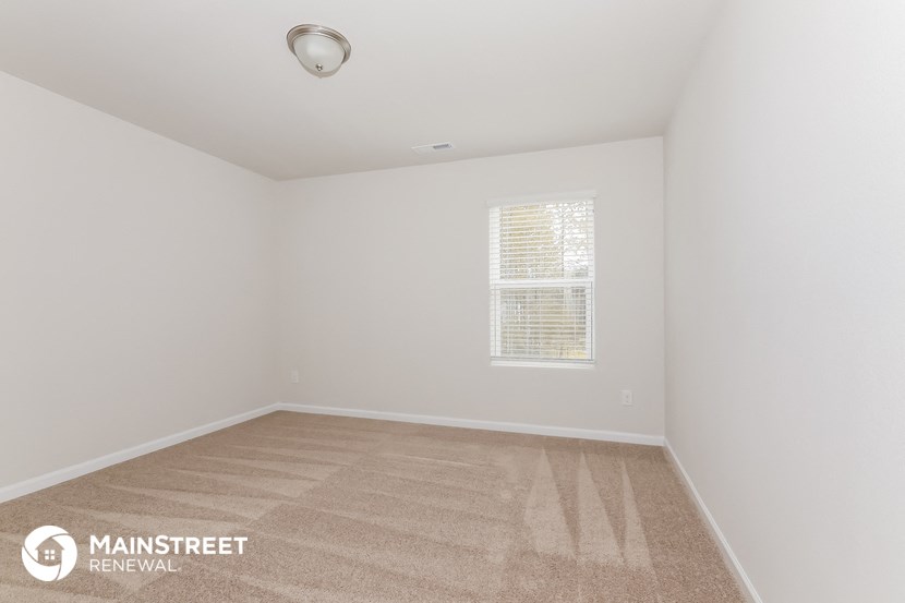 the spacious living room is clean and ready for you to use