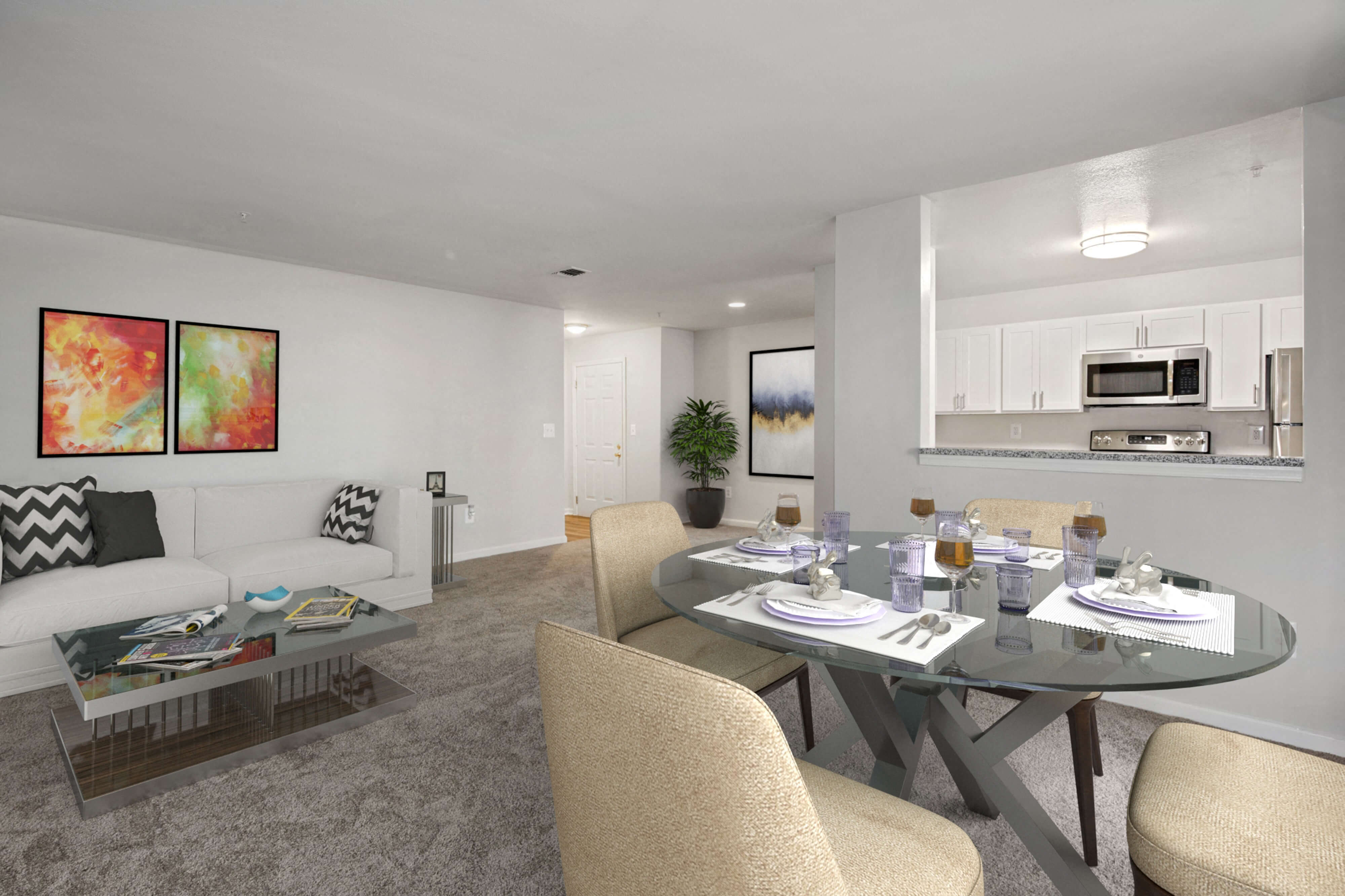 a living room and dining room with a glass table