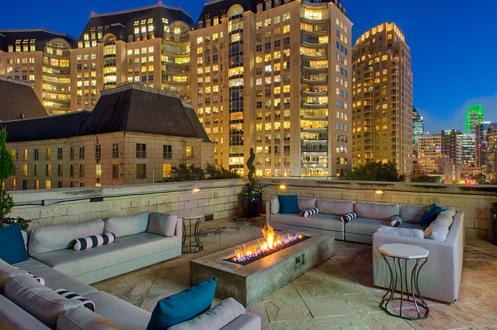 Luxury Rooftop Aqua Lounge in the heart of Dallas with firepit and outdoor seating