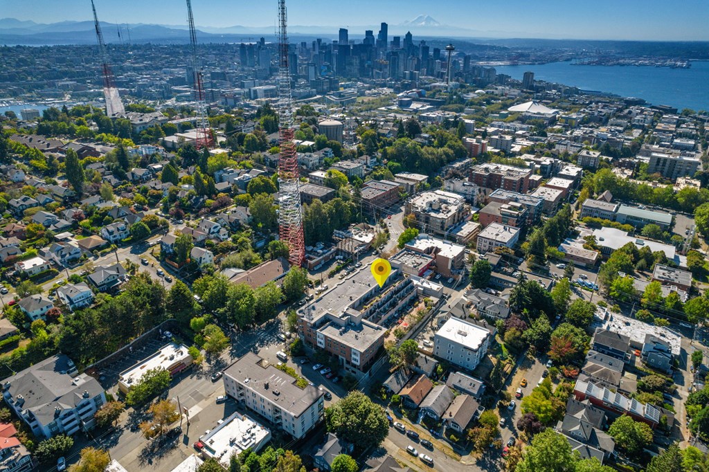 an aerial view of the city with the city skyline in the background