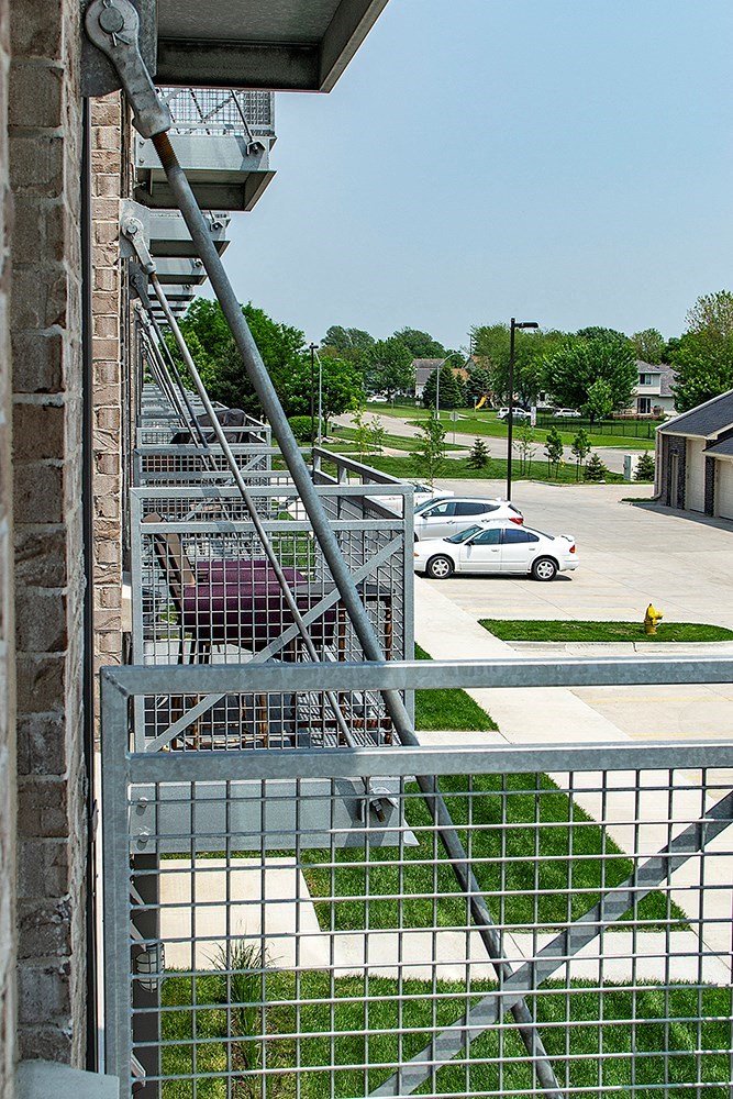 a metal staircase on the side of a building