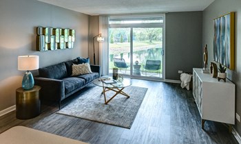 Living Room With Private Balcony at Foxboro Apartments, Wheeling - Photo Gallery 10