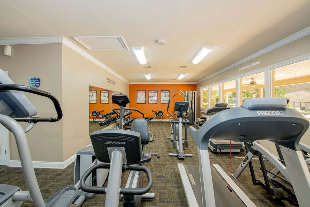 the gym at the village on spring mill apartments wi