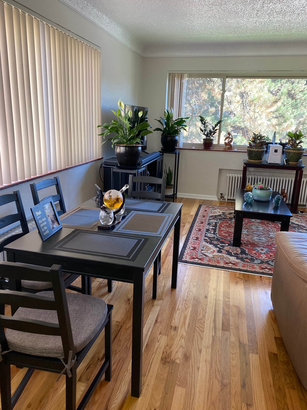 a dining room with a table and chairs