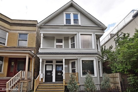 a with a porch and stairs
