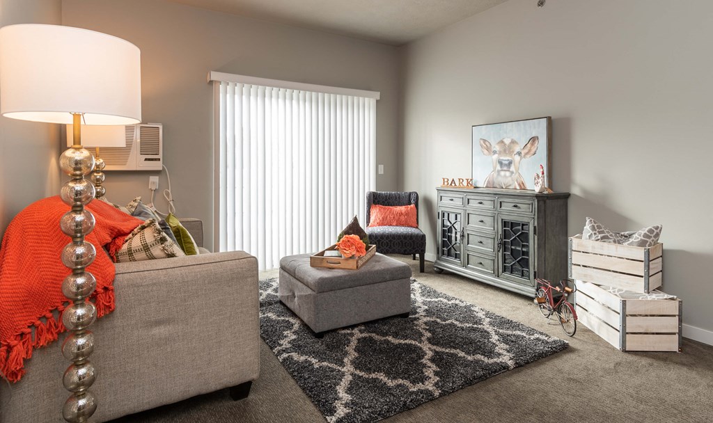 living room at the laureate apartments in laureate heights