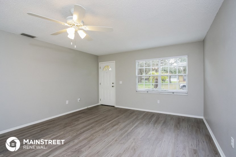 the spacious living room of our studio apartment at university estates in saint louis