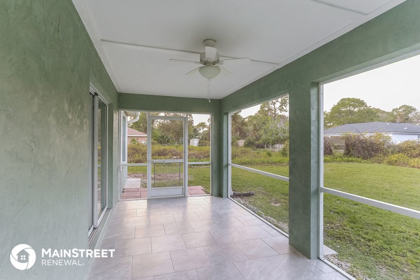 a view of the screened porch from the living room