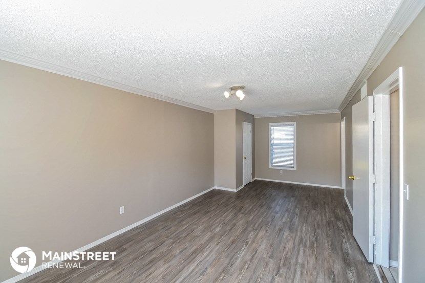 the living room and dining room are spacious and clean