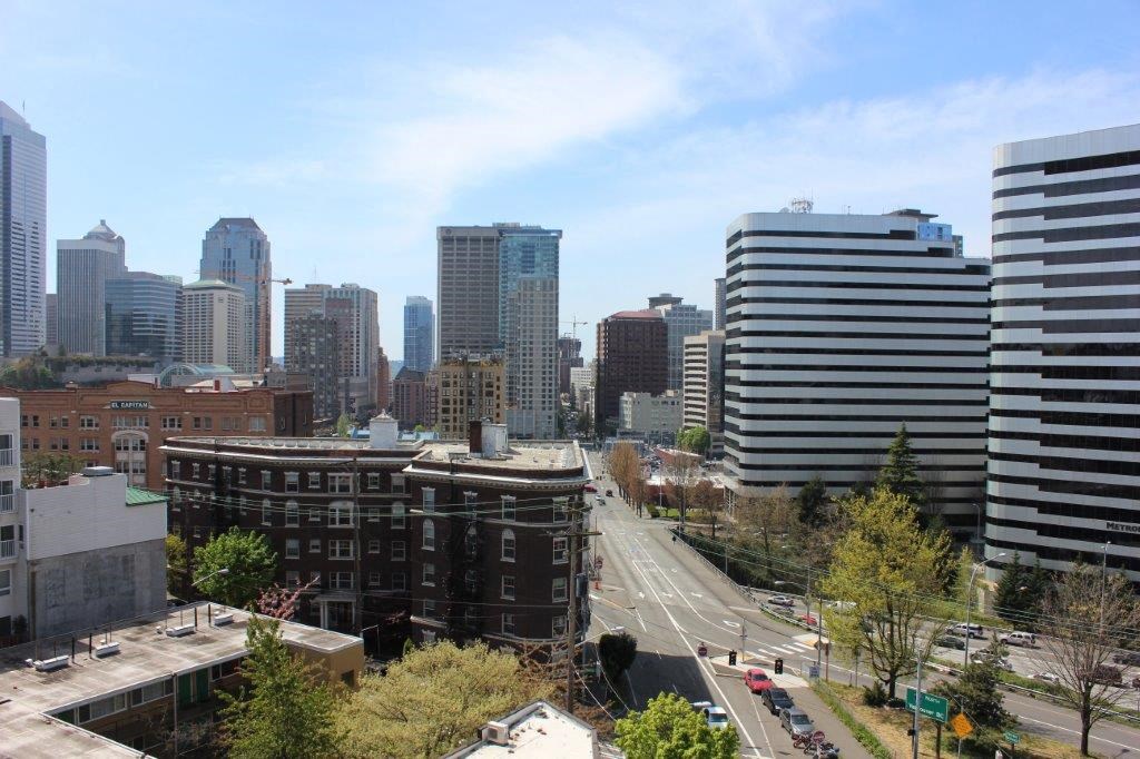 a view of the city from the roof of a building
