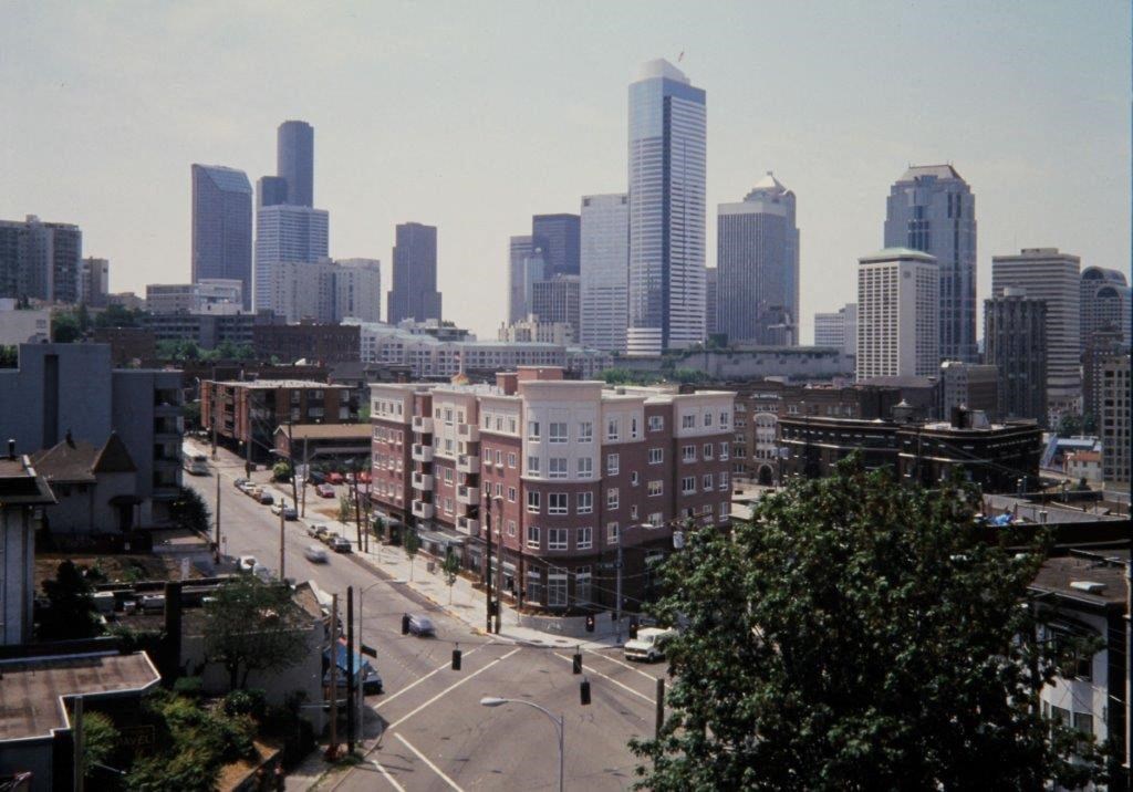 a view of the city skyline from a city street