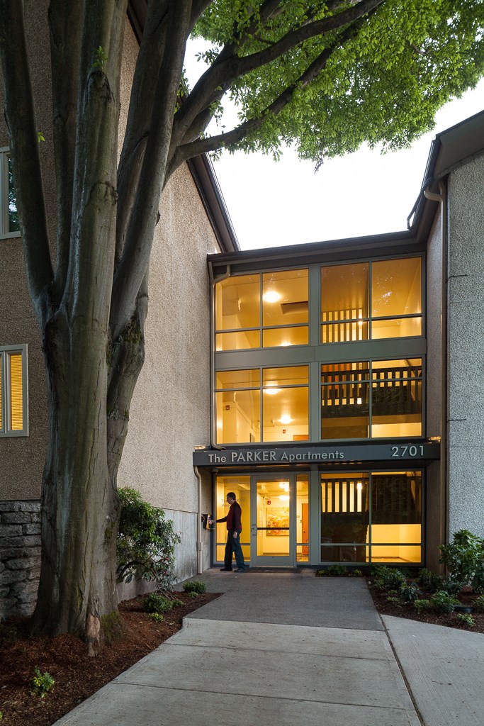 a person is standing outside of a building