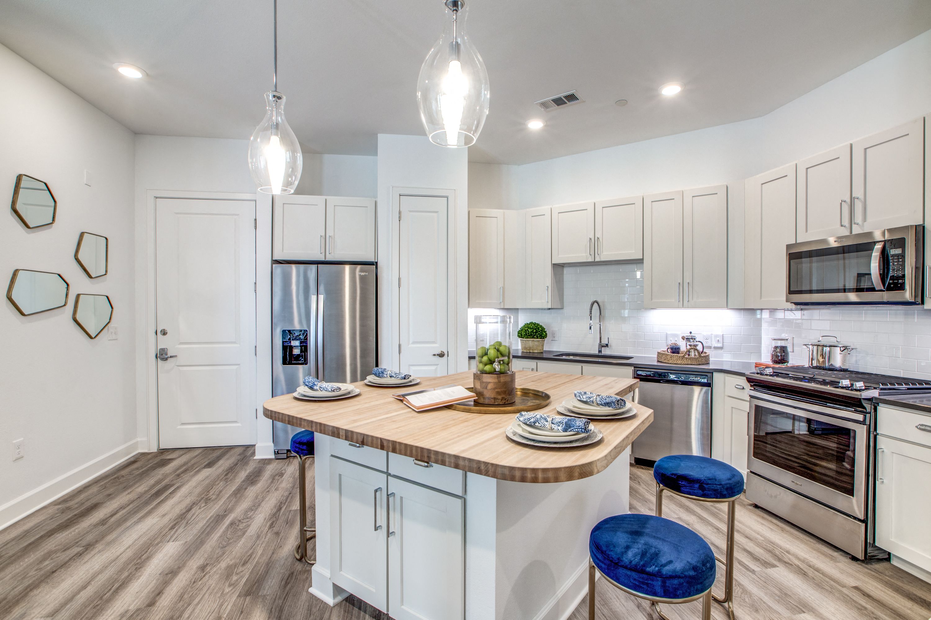 Two Bedroom Model with Butcher Block Islands s