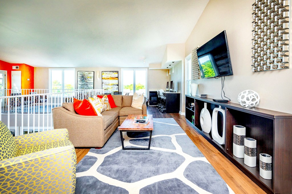 a living room with a couch and a television