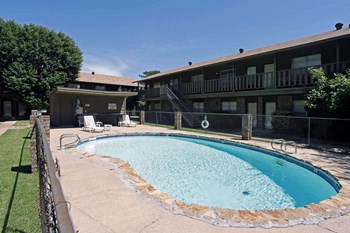 Image of pool and apartments