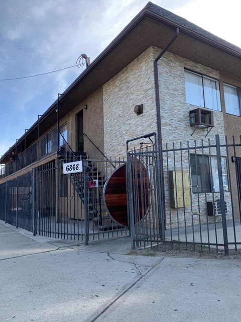 a building with a gate in front of it