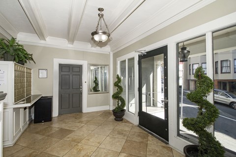 A room with a tiled floor and a ceiling light.