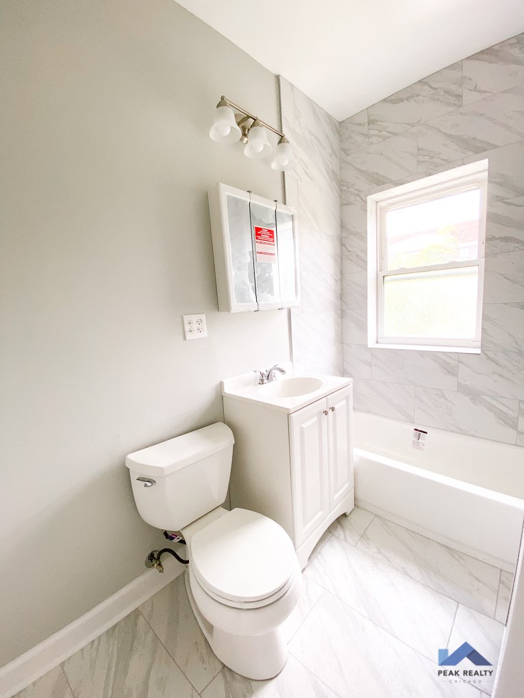 a small bathroom with a toilet and a sink