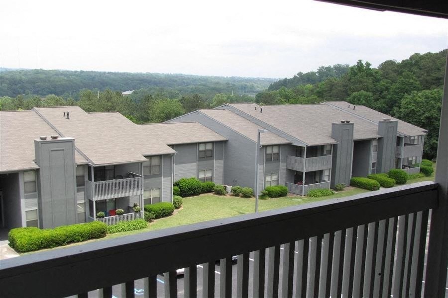 a view of an apartment building from a balcony