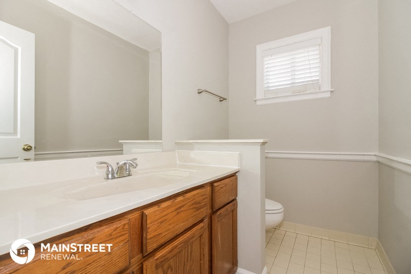 a bathroom with a sink and a toilet