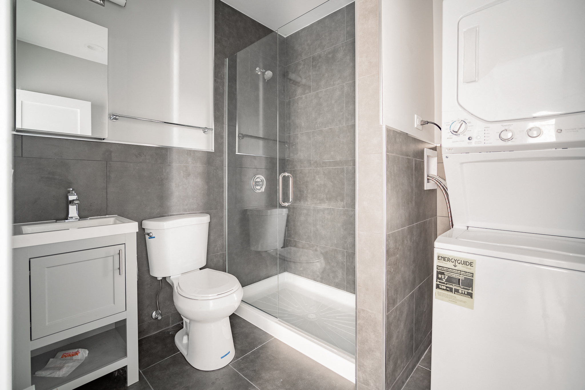 a small bathroom with a toilet and a shower