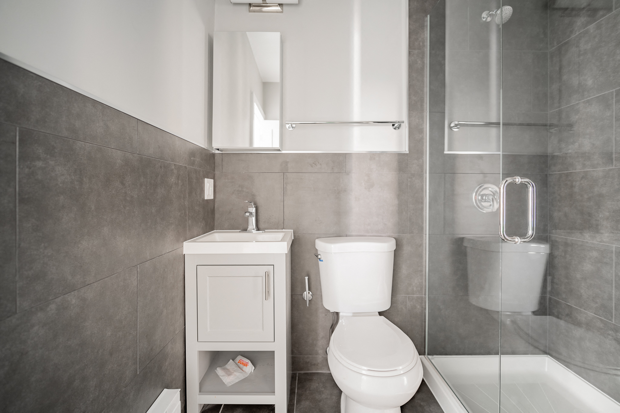 a small bathroom with a toilet and a shower