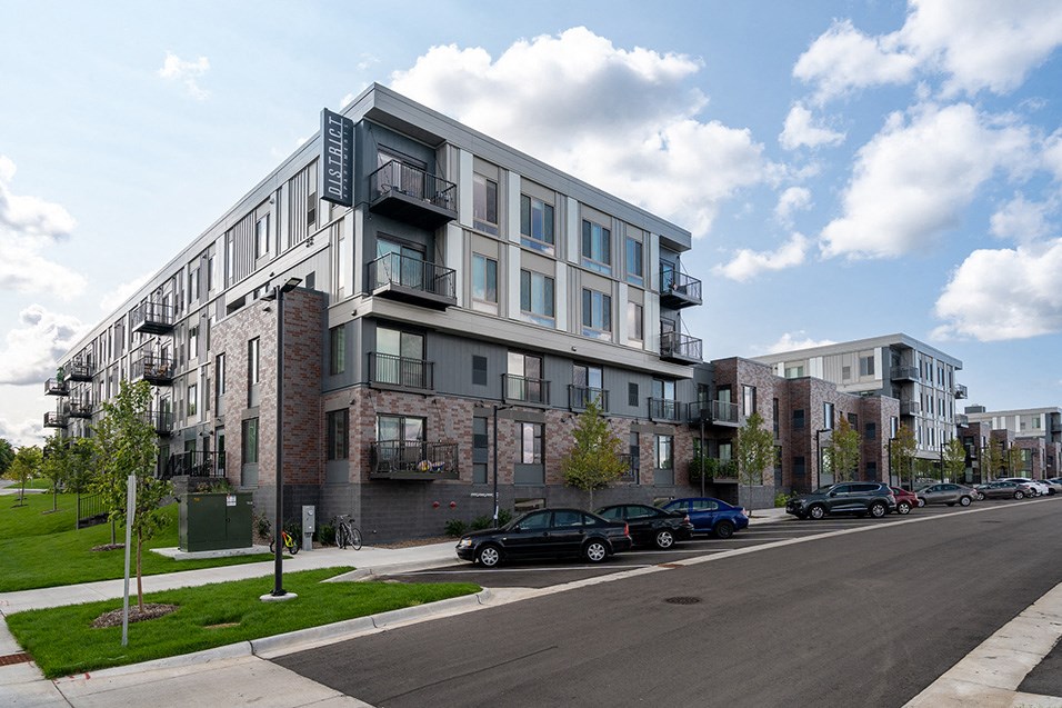 a modern apartment building on a city street