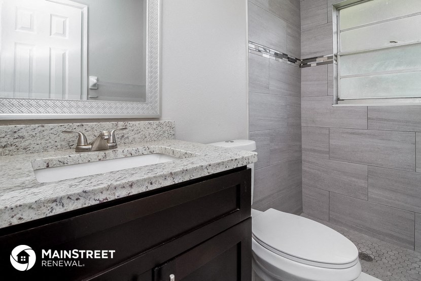 a bathroom with a sink and a toilet