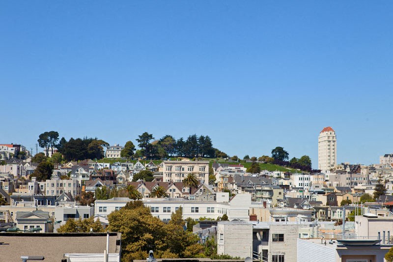 a view of the city from the roof of a building