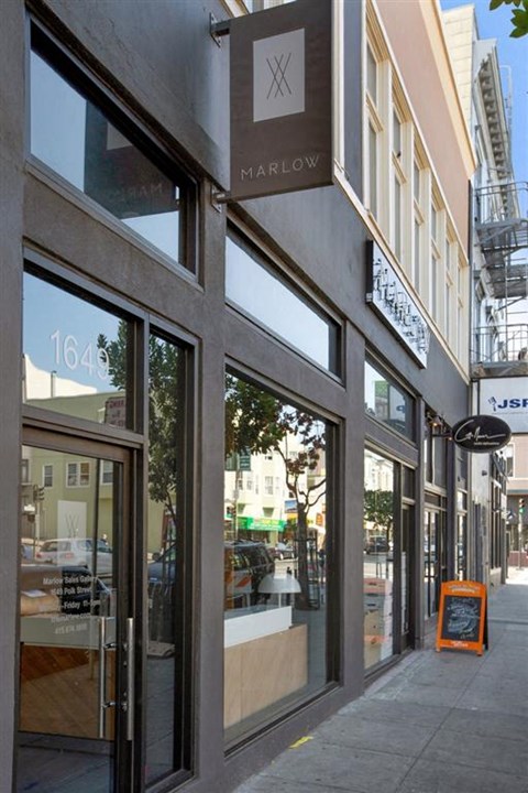 a store front of a building on a city street