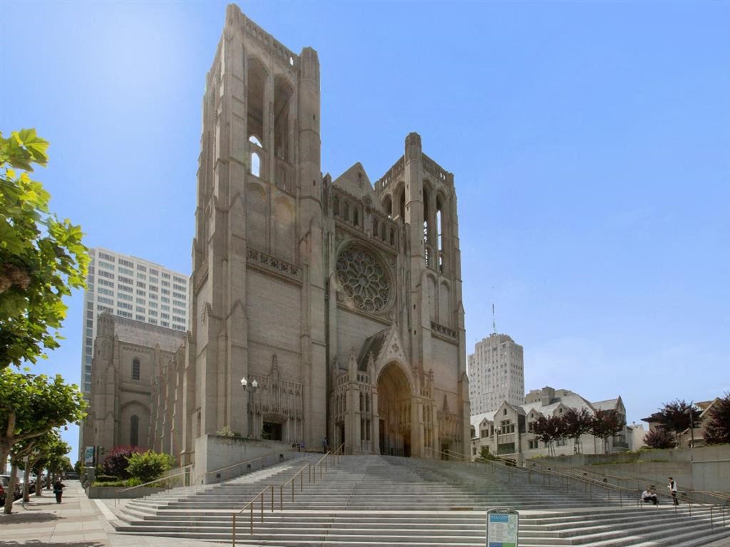 a large building with a clock on the front of it