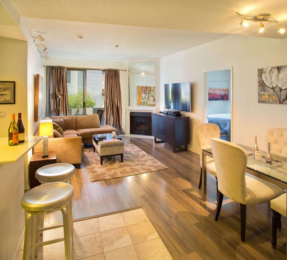 a living room and dining room with a couch and a table