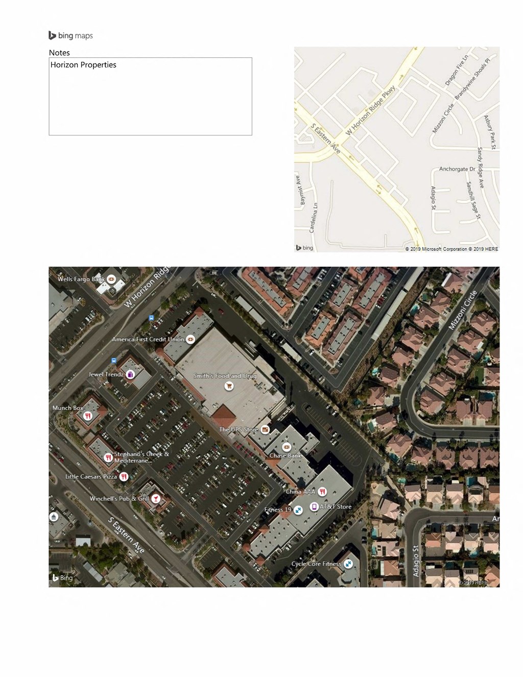 A satellite image of a residential area with roads and houses.