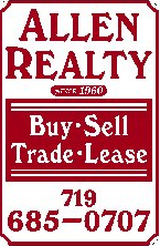 a red sign that reads buy sell trade lease