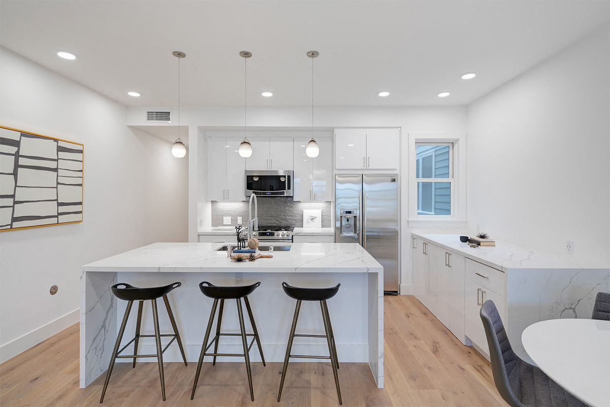 Furnished Living Room View of Kitchen