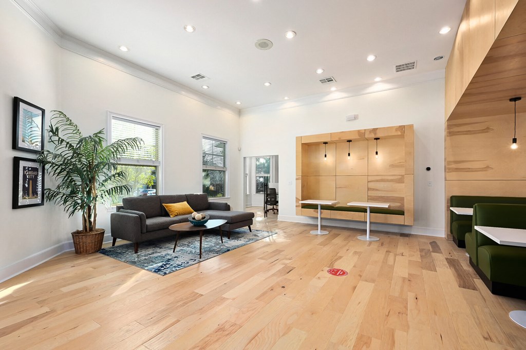 a living room with a couch and a table