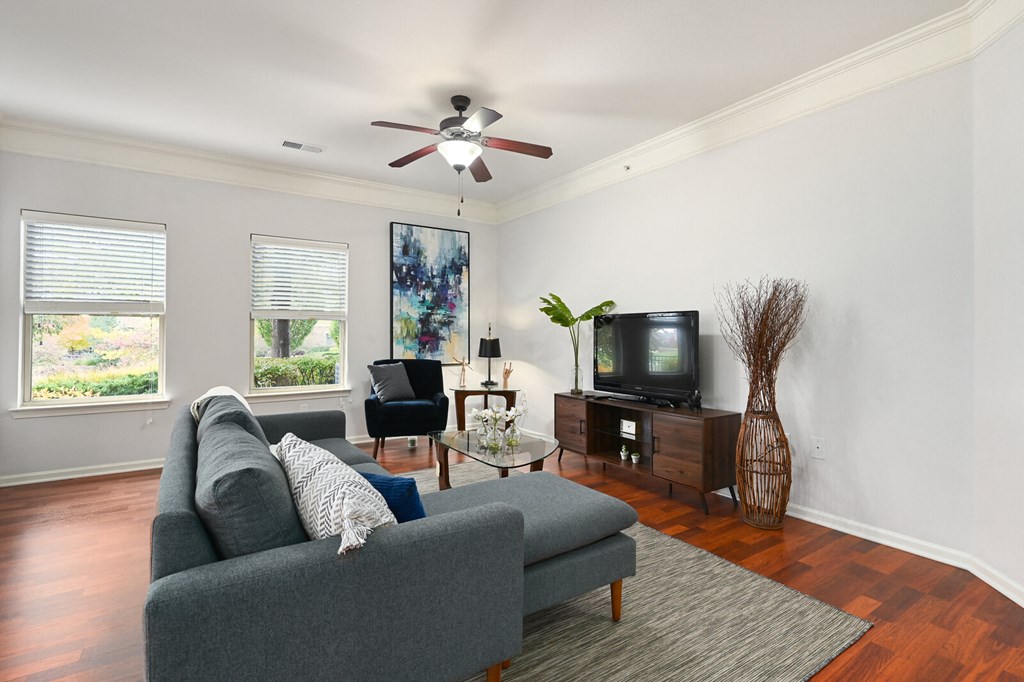 a living room with a couch and a tv