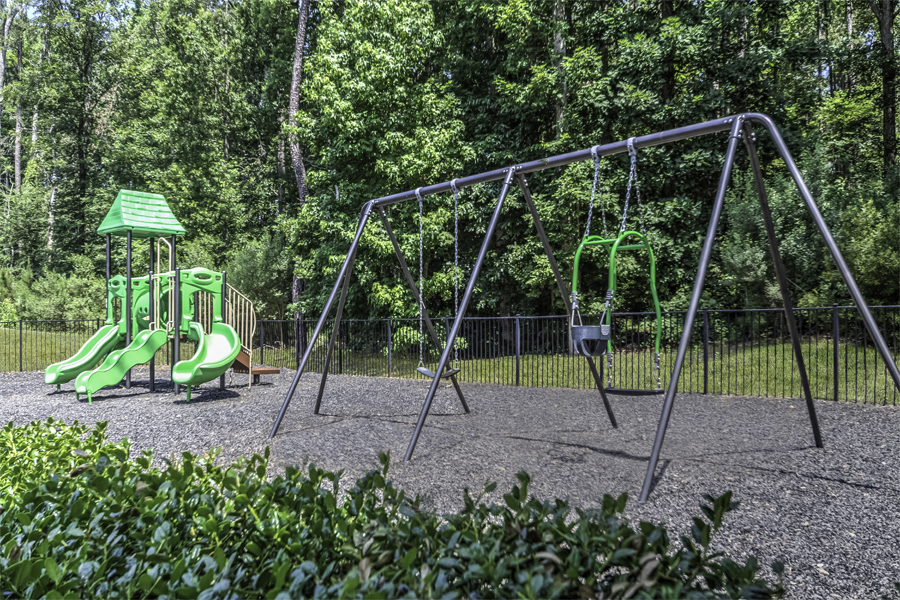 Luxury Apartments Cary NC - Chancery Village - On-site playground with swing set