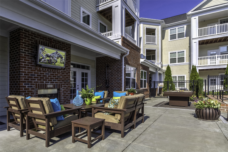 Luxury Apartments Cary NC - Chancery Village - Entertain guests outside at the poolside lounge