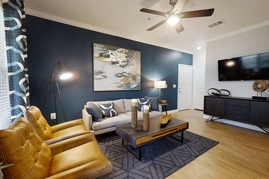 a living room with a couch and a tv