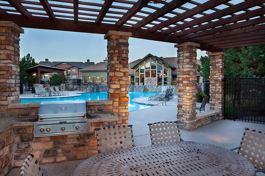 The Sanctuary at Tallyns Reach Apartments in Aurora, CO - pavilion with bbq grills