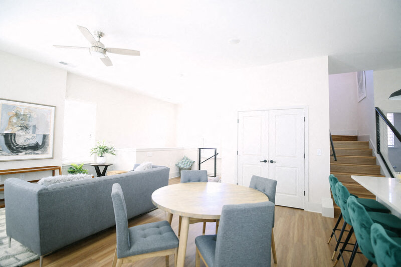 a living room with a couch and a table