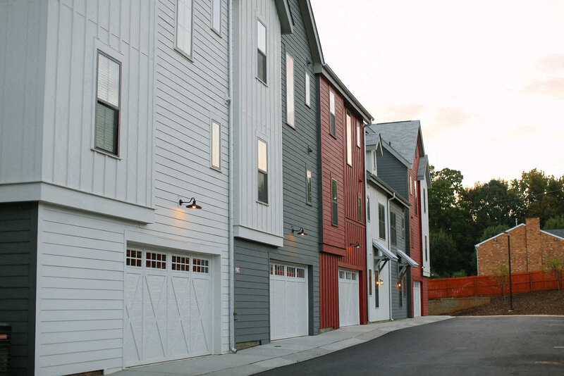 a row of town houses on a street