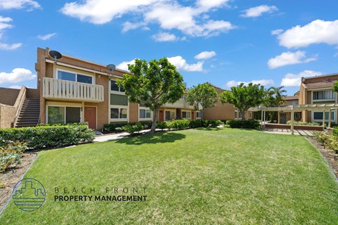 A sunny day at the beach front property managed by Beach Front Property Management.